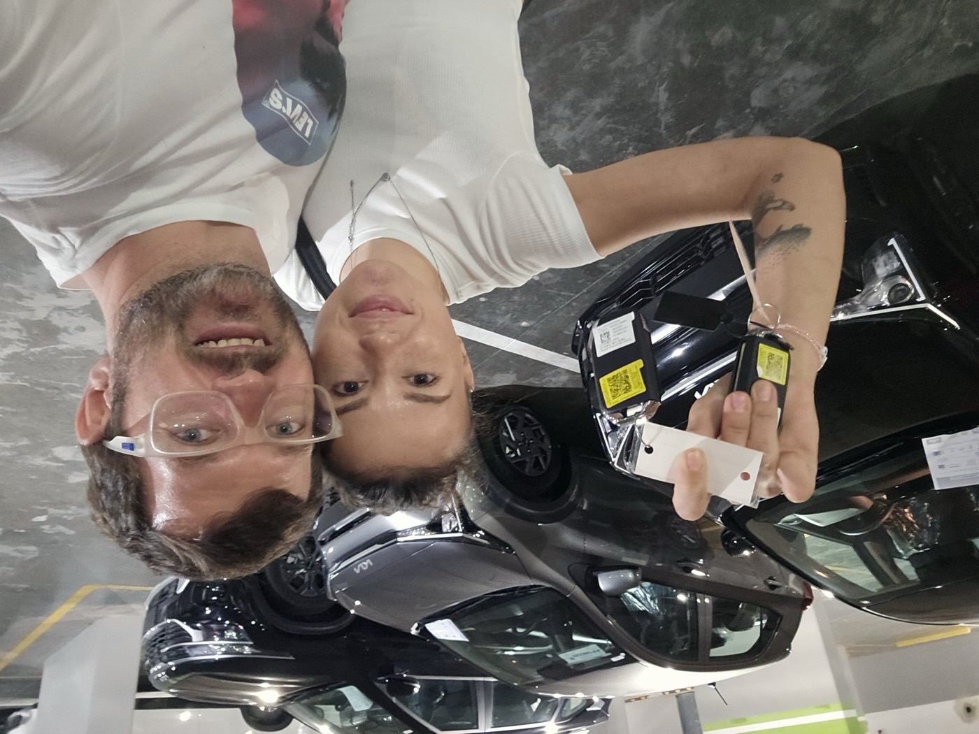 Alexander Karpetsky, Founder and CEO of VROOM.DO, and Karyna Koval, Co-Founder and Marketing Director, photographed with the original VROOM.DO fleet of five vehicles at their Punta Cana location in February 2024.